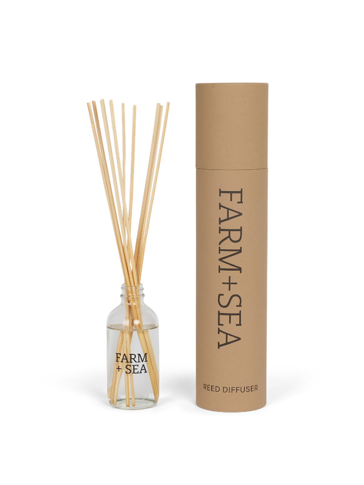 Reed diffuser set with bottle and cardboard tube labeled 'Farm + Sea' on a white background